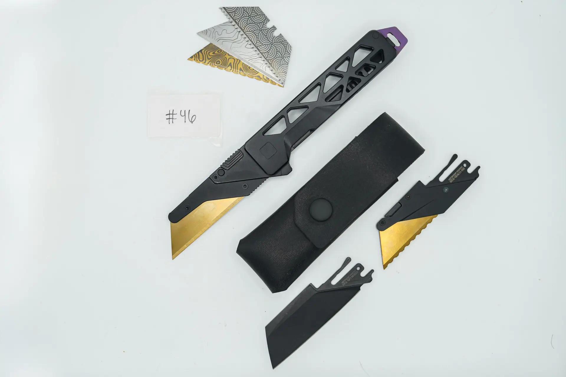 BUILD #46s Combo — Condition 9/10 — TiRant ULTRA Jet-Black PVD Skultra Skeleton + Installed SKIFF Bearings + Purple Haze ANO Pry Bar Skeleton Full Backspacer + M390 Sheepsfoot Blade Extra-Thick 2.5MM + V1 Quick Release HotSwap Insert (Not Recommended For Tough Tasks) + 3X Custom Laser Engraved Razor Blades + 10/10 Black Horween Leather Sheath (Specially Selected from the section of leather with official “Horween” Stamp, RARE!)