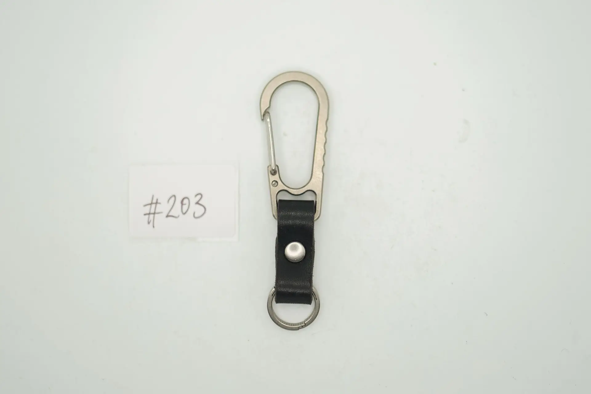 BUILD #203 Condition 10/10 — V1 Titanium Carabiner W/Ti Key Ring – Light Stonewash Ti + Black Leather + Silver Rivet