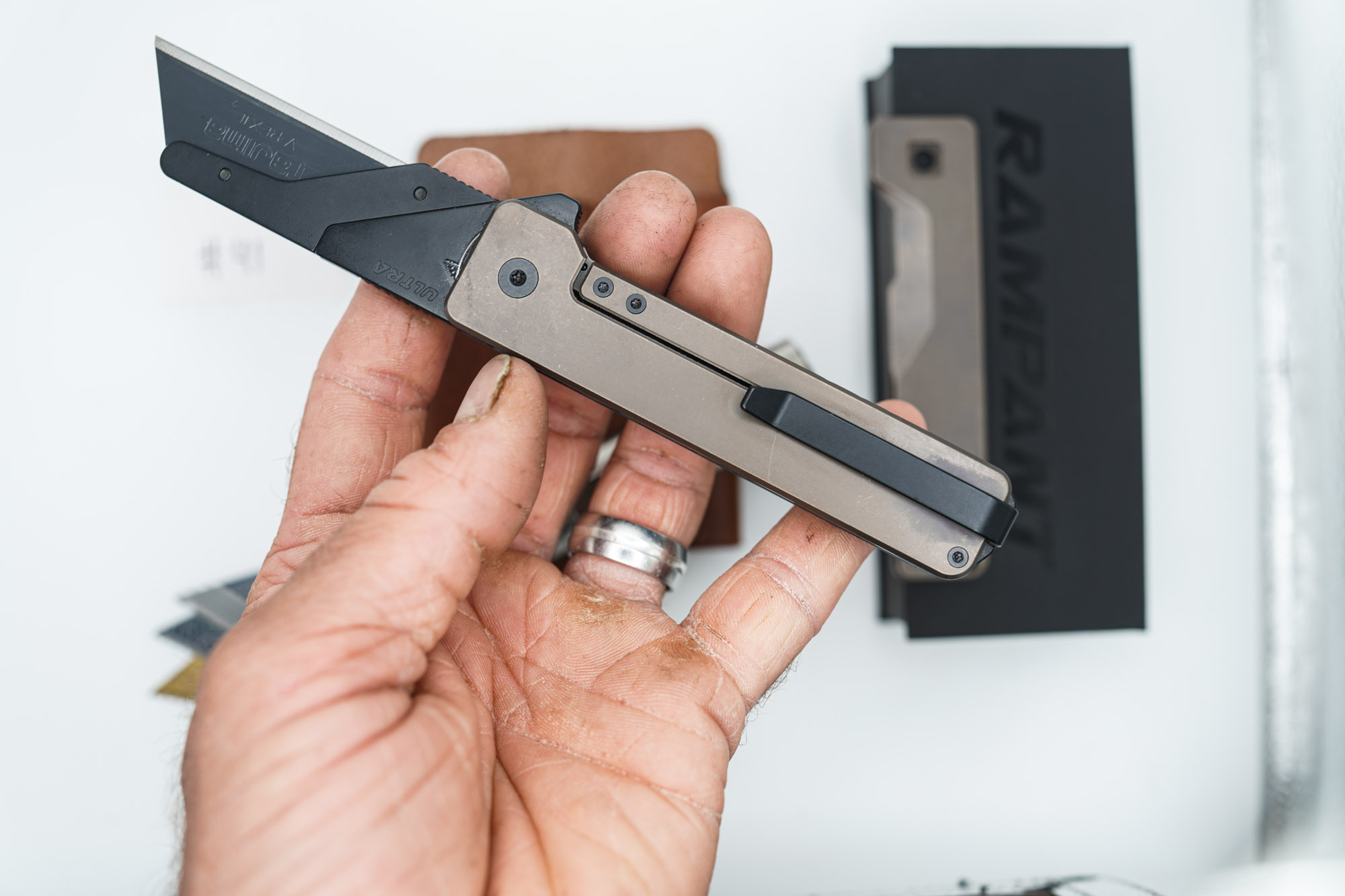 BUILD #41 Combo — Condition 9/10 — TiRant ULTRA Jet-Black PVD 50/50 RH Carbon Fiber Smooth / Bronze And LH Scale + Space Bronze RH Scale + 3X Custom Laser Engraved Razor Blades + RAW 519a Rampant R4 Titanium Flashlight + 9/10 Prototype Brown Leather FieldPro Pocket Organizer - Image 4