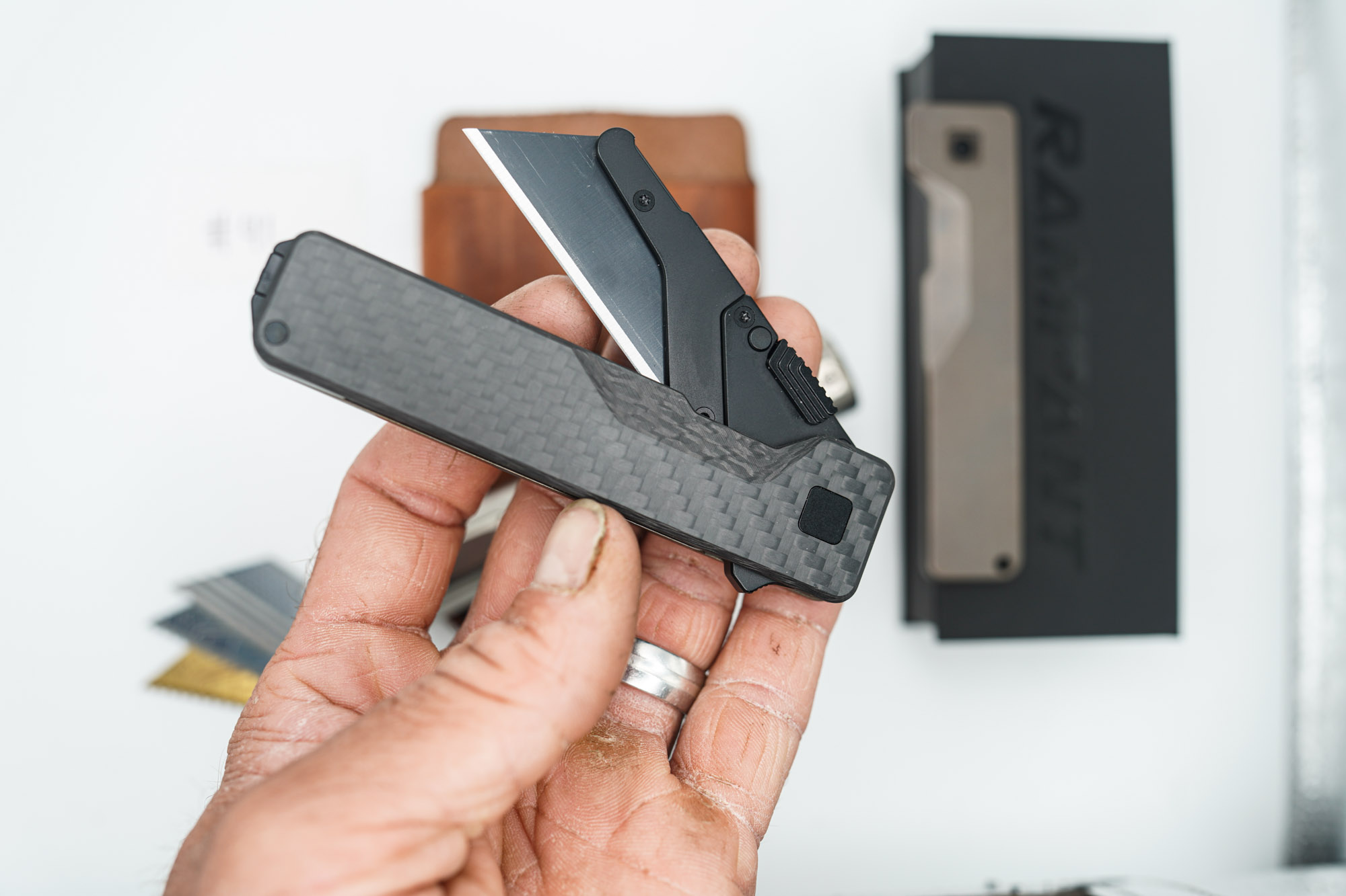 BUILD #41 Combo — Condition 9/10 — TiRant ULTRA Jet-Black PVD 50/50 RH Carbon Fiber Smooth / Bronze And LH Scale + Space Bronze RH Scale + 3X Custom Laser Engraved Razor Blades + RAW 519a Rampant R4 Titanium Flashlight + 9/10 Prototype Brown Leather FieldPro Pocket Organizer - Image 7