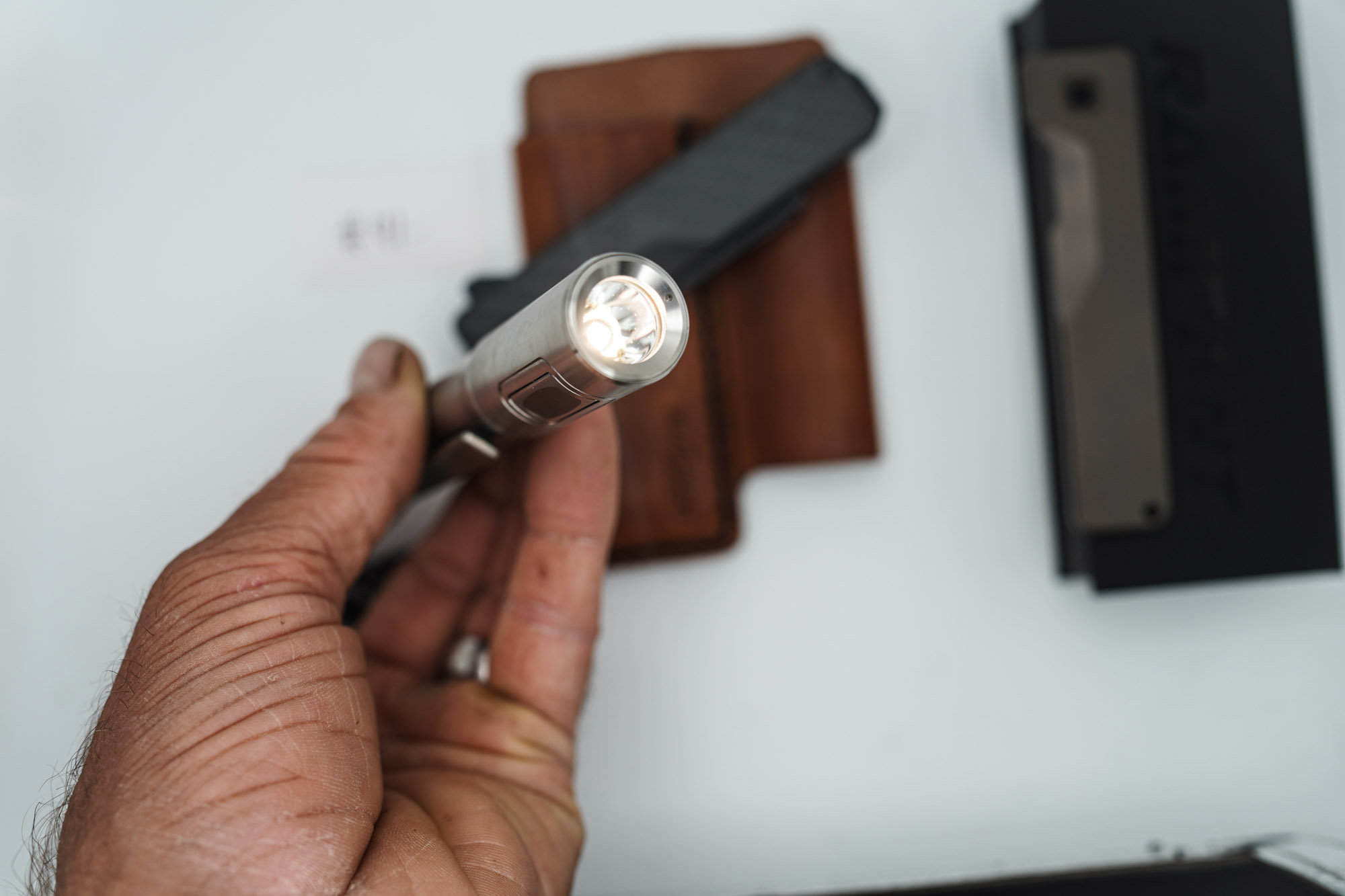 BUILD #41 Combo — Condition 9/10 — TiRant ULTRA Jet-Black PVD 50/50 RH Carbon Fiber Smooth / Bronze And LH Scale + Space Bronze RH Scale + 3X Custom Laser Engraved Razor Blades + RAW 519a Rampant R4 Titanium Flashlight + 9/10 Prototype Brown Leather FieldPro Pocket Organizer - Image 12