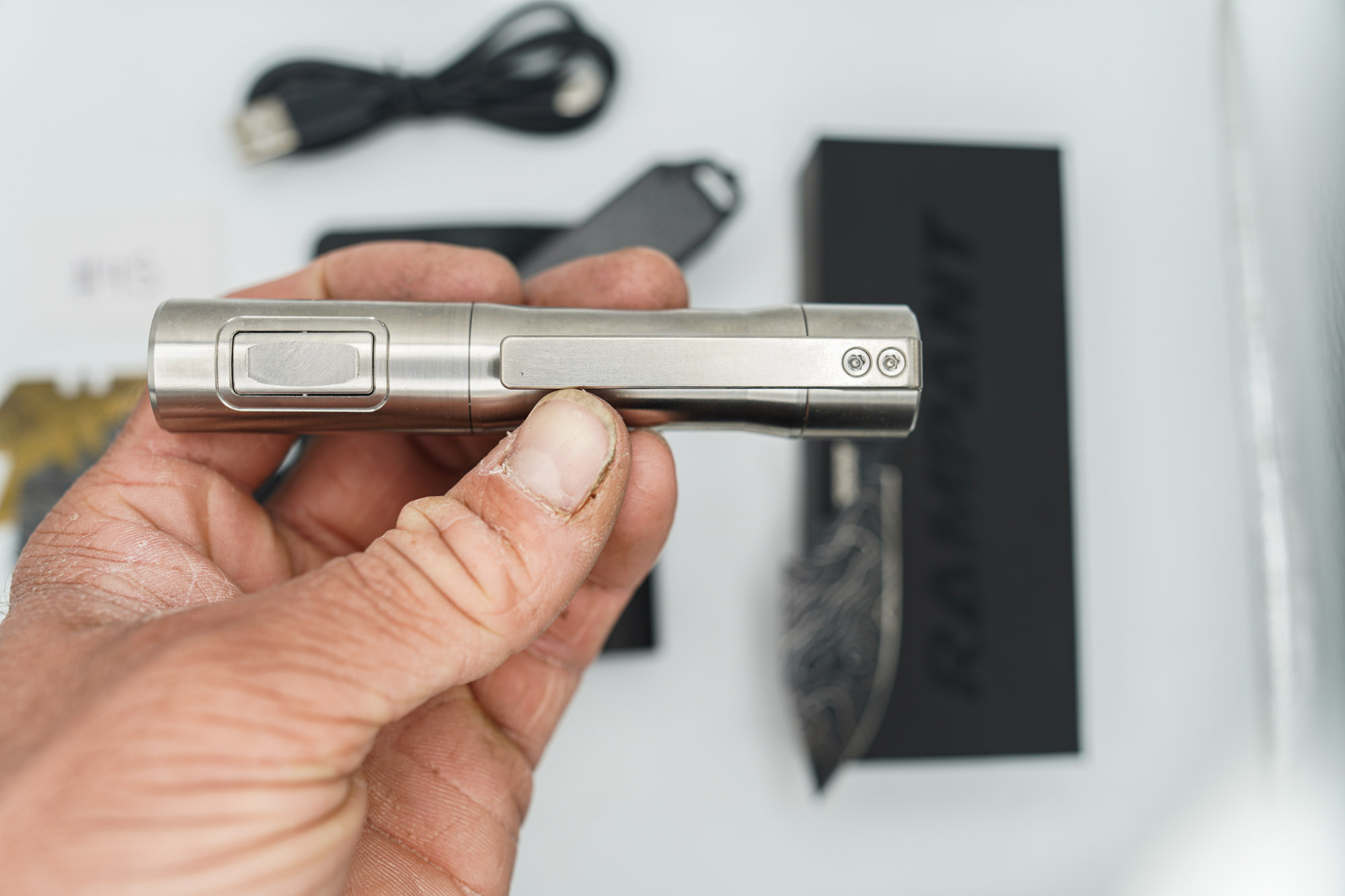 BUILD #45 Combo — Condition 9/10 — TiRant ULTRA 50/50 Carbon Fiber RH Scale / Jet-Black PVD Titanium LH Scale + Skeleton Glass Breaker Loop Backspacer + D2 Topo Half Laser Engraved Drop Point Hotswap Blade + 4X Custom Laser Engraved Razor Blades + 10/10 RAW 519a Rampant R4 Aluminum Flashlight + 10/10 Black Leather FieldPro Pocket Organizer W/Belt Loop - Image 8