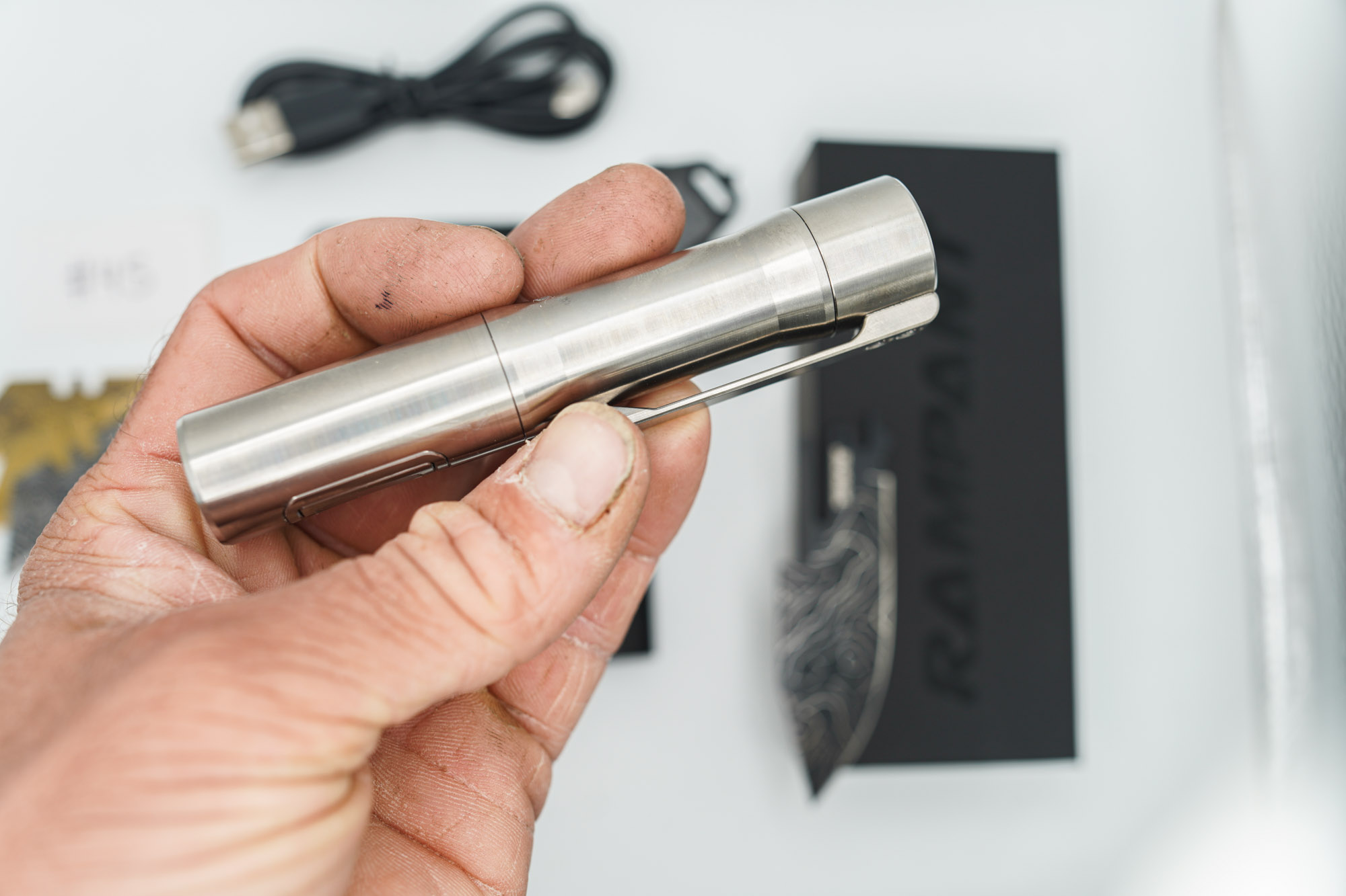 BUILD #45 Combo — Condition 9/10 — TiRant ULTRA 50/50 Carbon Fiber RH Scale / Jet-Black PVD Titanium LH Scale + Skeleton Glass Breaker Loop Backspacer + D2 Topo Half Laser Engraved Drop Point Hotswap Blade + 4X Custom Laser Engraved Razor Blades + 10/10 RAW 519a Rampant R4 Aluminum Flashlight + 10/10 Black Leather FieldPro Pocket Organizer W/Belt Loop - Image 9