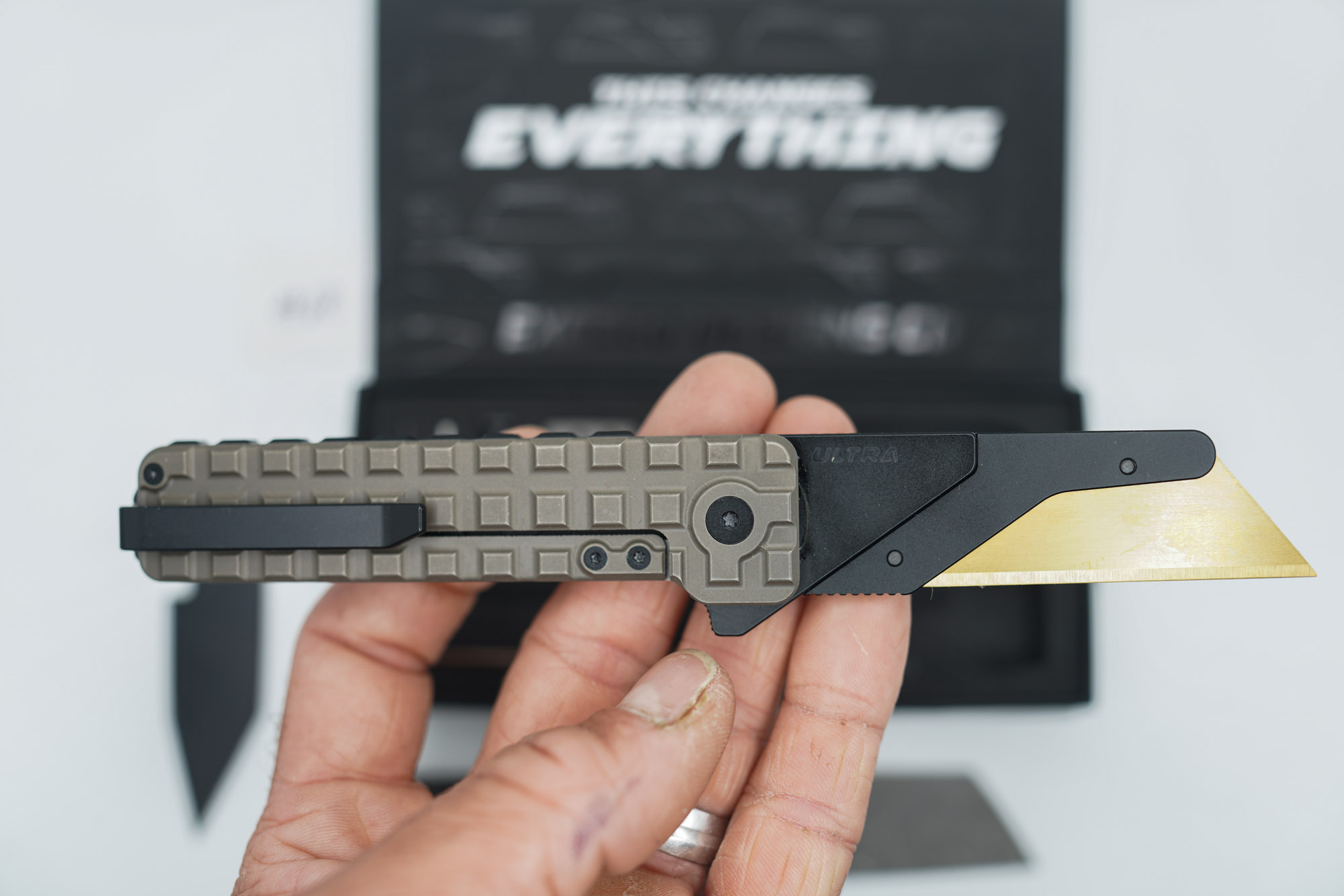 BUILD #68 — Condition 9/10 — TiRant ULTRA FULL FRAG Edition (Centurion Bronze ANO) W/Frag Milled Backspacer Pre-Installed + Original Box W/Spare Jet-Black PVD Hardware Kit / Lock Bar insert + D2 Jet-Black Tanto Hotswap Blade + Blem Topo-engraved Jet-Black D2 Drop Point Blade + Blem Sheepsfoot Topo Laser Engraved D2 blade - Image 4