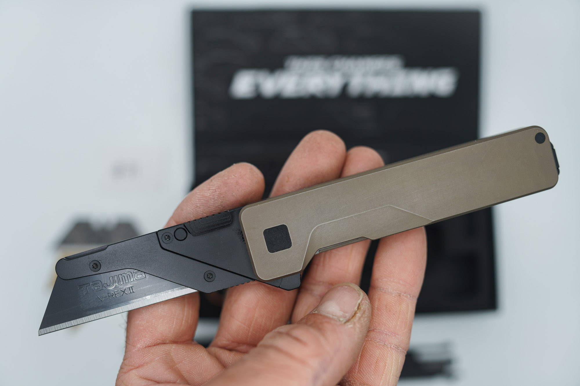 BUILD #71 — Condition 8/10 — TiRant ULTRA Smooth Centurion Bronze W/Black Hardware Contrast (Small scratch near clip only, See Pic) + Original Box W/Spare Jet-Black PVD Hardware Kit / Lock Bar insert + D2 Jet-Black Sheepsfoot Hotswap Blade + D2 Jet-Black Tanto Hotswap Blade + 4X Custom Laser Engraved Razor Blades - Image 4