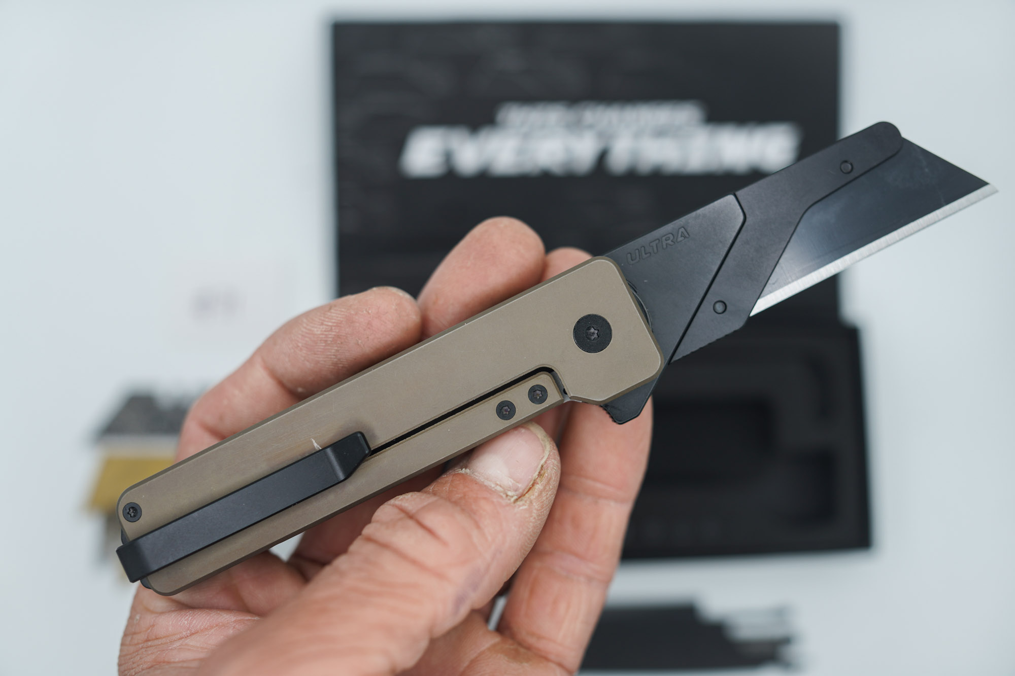 BUILD #71 — Condition 8/10 — TiRant ULTRA Smooth Centurion Bronze W/Black Hardware Contrast (Small scratch near clip only, See Pic) + Original Box W/Spare Jet-Black PVD Hardware Kit / Lock Bar insert + D2 Jet-Black Sheepsfoot Hotswap Blade + D2 Jet-Black Tanto Hotswap Blade + 4X Custom Laser Engraved Razor Blades - Image 2