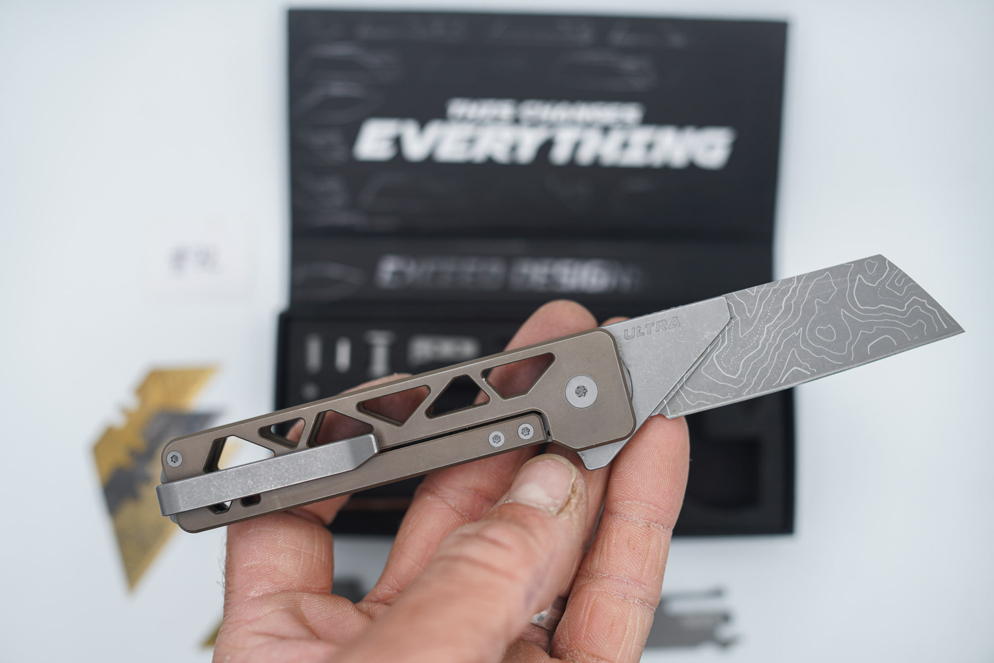 BUILD #72 — Condition 8/10 — TiRant ULTRA Skeleton 'SKULTRA' Centurion Bronze W/Blasted Grey Hardware + Original Box W/Spare Grey Blasted Hardware Kit / Lock Bar insert + D2 V2-Topo Sheepsfoot Hotswap Blade + D2 Stonewashed Drop Point Hotswap Blade + 3X Custom Laser Engraved Razor Blades - Image 5