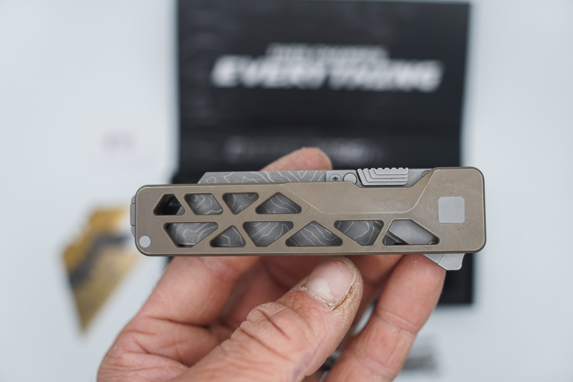 BUILD #72 — Condition 8/10 — TiRant ULTRA Skeleton 'SKULTRA' Centurion Bronze W/Blasted Grey Hardware + Original Box W/Spare Grey Blasted Hardware Kit / Lock Bar insert + D2 V2-Topo Sheepsfoot Hotswap Blade + D2 Stonewashed Drop Point Hotswap Blade + 3X Custom Laser Engraved Razor Blades - Image 2