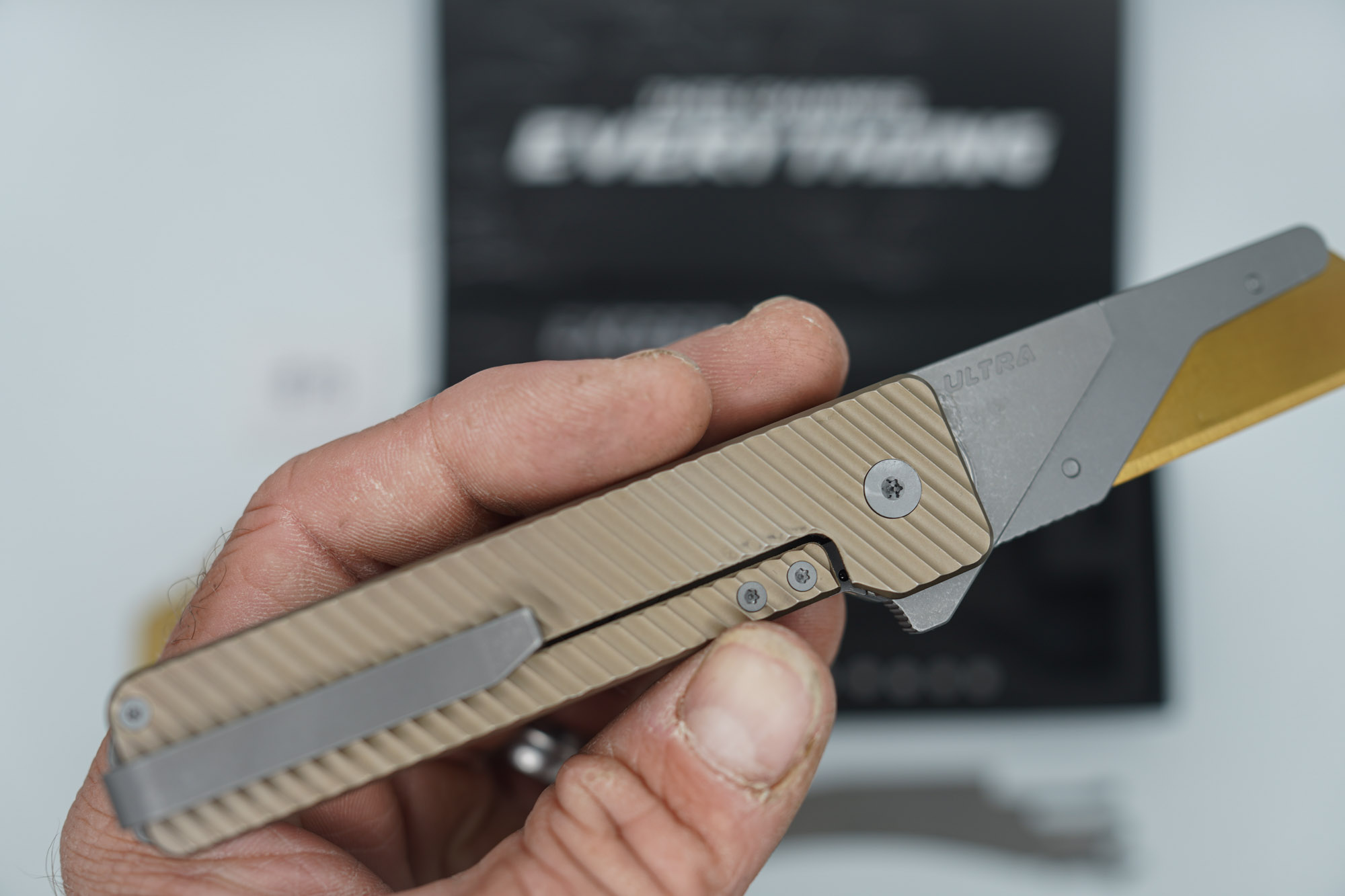 BUILD #75 — Condition 9/10 — TiRant ULTRA Deep-Slash DUAL Milled Centurion Light-Bronze - Minor Blem in ANO finish (See Photos) W/Blasted Grey Hardware + Original Box W/Spare Grey Blasted Hardware Kit / Lock Bar insert + D2 Stonewashed Hawkbill Hotswap Blade + D2 Stonewashed Drop Point Hotswap Blade + 3X Custom Laser Engraved Razor Blades - Image 6