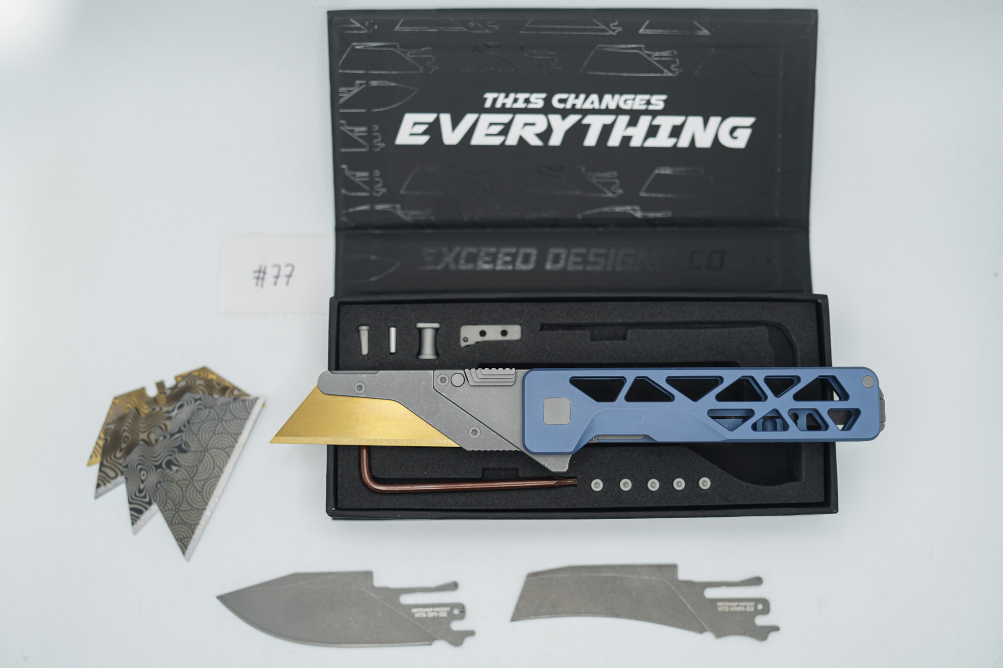 BUILD #77 — Condition 9/10 — TiRant ULTRA Skeleton 'SKULTRA' Custom Aqua-BLUE Titanium ANO W/Blasted Grey Hardware + Original Box W/Spare Grey Blasted Hardware Kit / Lock Bar insert + D2 Stonewashed Hawkbill Hotswap Blade + D2 Stonewashed Drop Point Hotswap Blade + 4X Custom Laser Engraved Razor Blades - Image 3