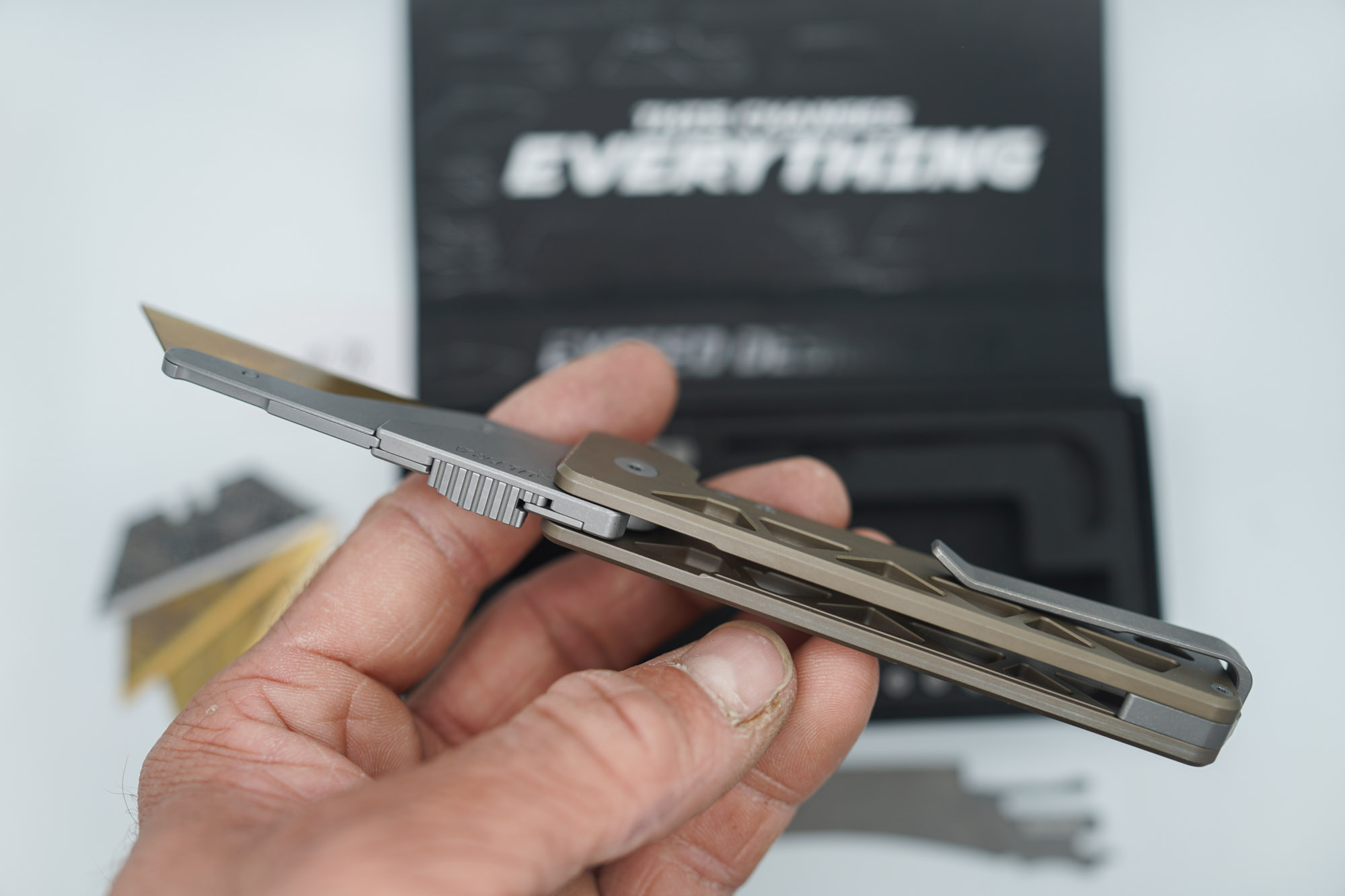 BUILD #78 — Condition 8/10 — TiRant ULTRA Skeleton 'SKULTRA' Centurion Bronze W/Blasted Grey Hardware + Original Box W/Spare Grey Blasted Hardware Kit / Lock Bar insert + D2 Hawkbill Hotswap Blade + D2 Jet-Black Drop Point Hotswap Blade + 3X Custom Laser Engraved Razor Blades - Image 5