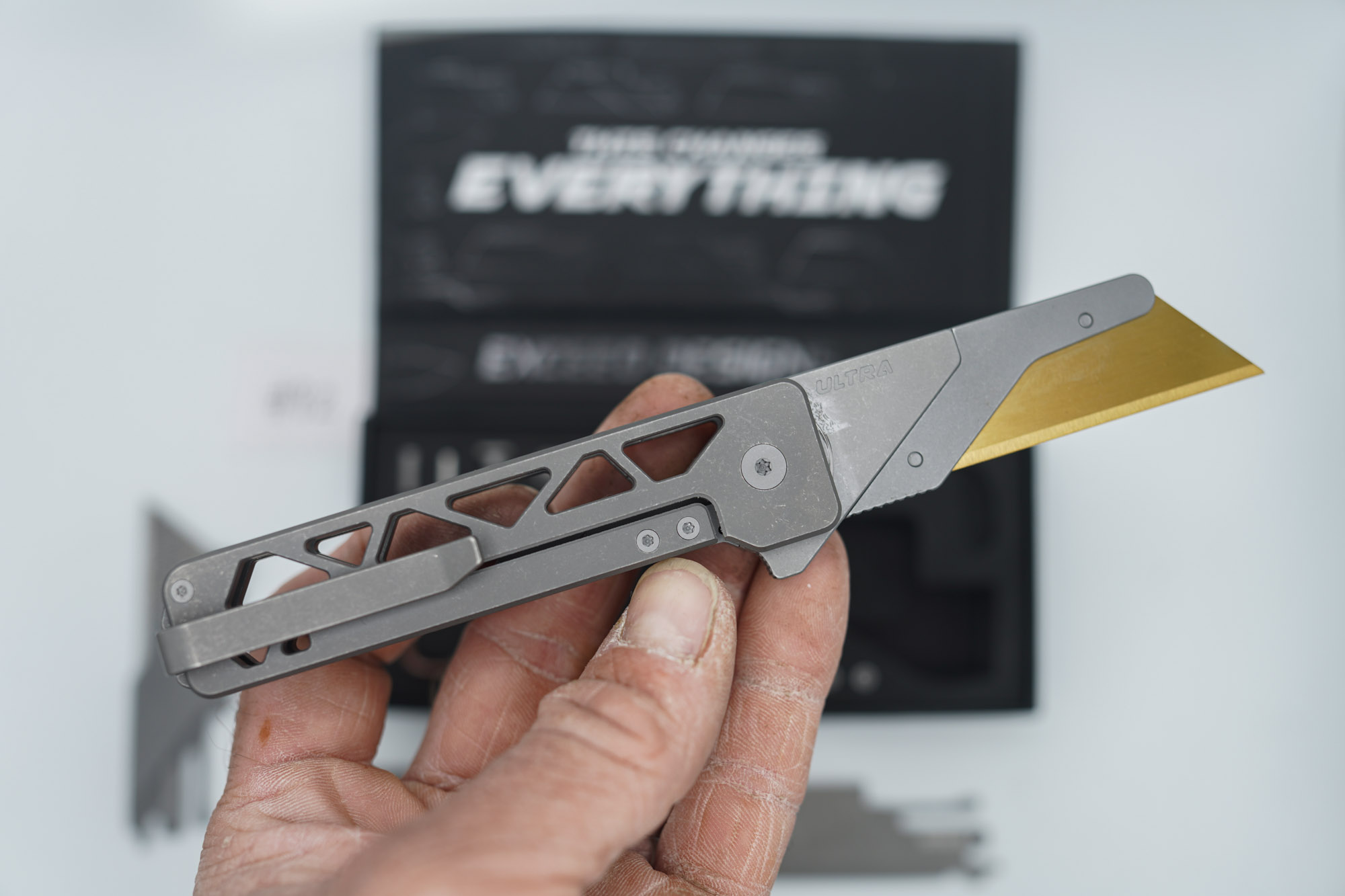 BUILD #82 — Condition 10/10 — TiRant ULTRA Skeleton 'SKULTRA' Dark Wash Titanium W/Blasted Grey Hardware + Original Box W/Spare Grey Blasted Hardware Kit / Lock Bar insert + V2 Razor Blade Quick Release Hotswap Insert + D2 Blem Stonewashed Hawkbill Hotswap Blade + D2 Stonewashed Full Razor Hotswap Insert + 3X Custom Laser Engraved Razor Blades - Image 5
