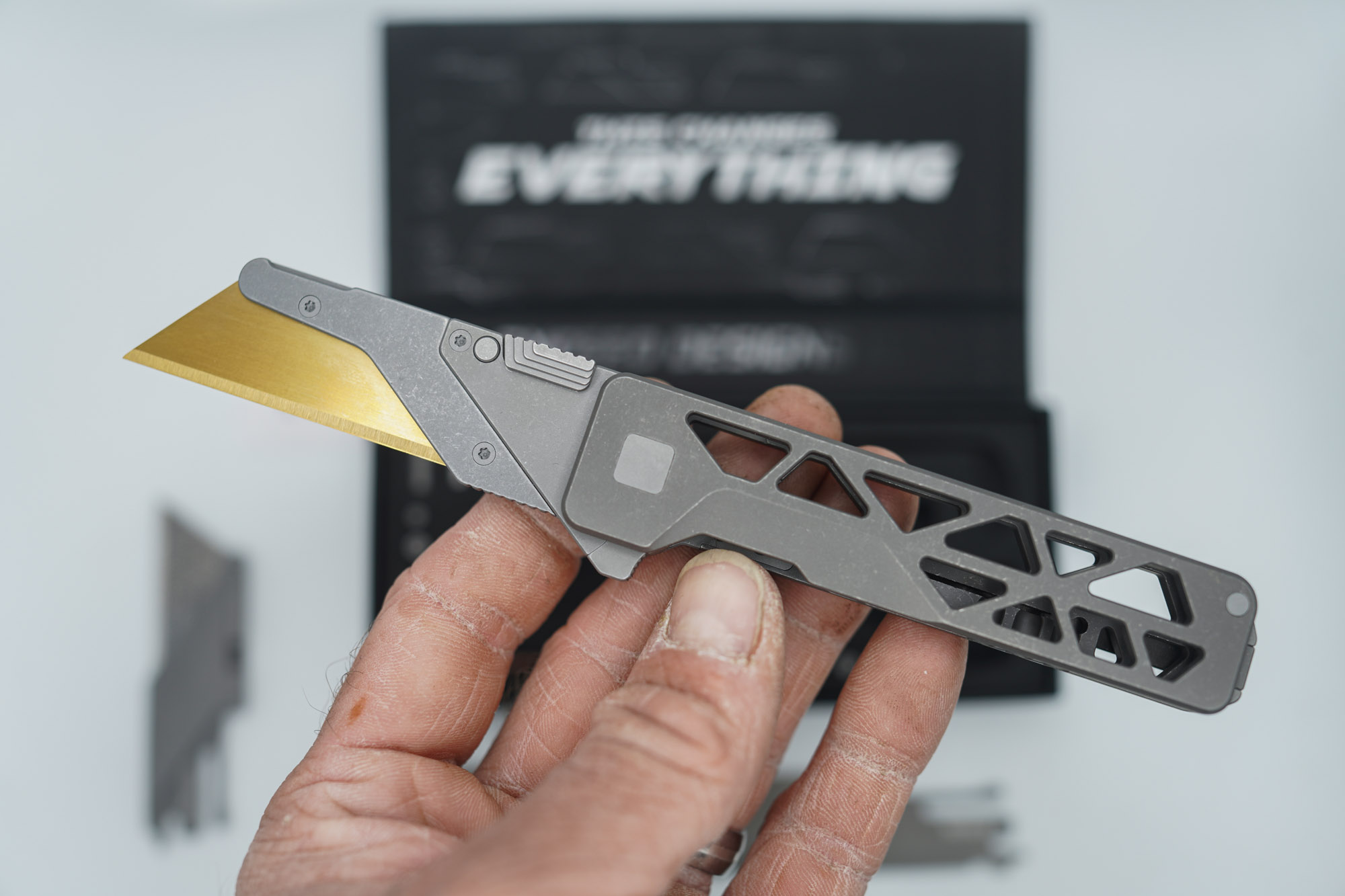 BUILD #82 — Condition 10/10 — TiRant ULTRA Skeleton 'SKULTRA' Dark Wash Titanium W/Blasted Grey Hardware + Original Box W/Spare Grey Blasted Hardware Kit / Lock Bar insert + V2 Razor Blade Quick Release Hotswap Insert + D2 Blem Stonewashed Hawkbill Hotswap Blade + D2 Stonewashed Full Razor Hotswap Insert + 3X Custom Laser Engraved Razor Blades - Image 2