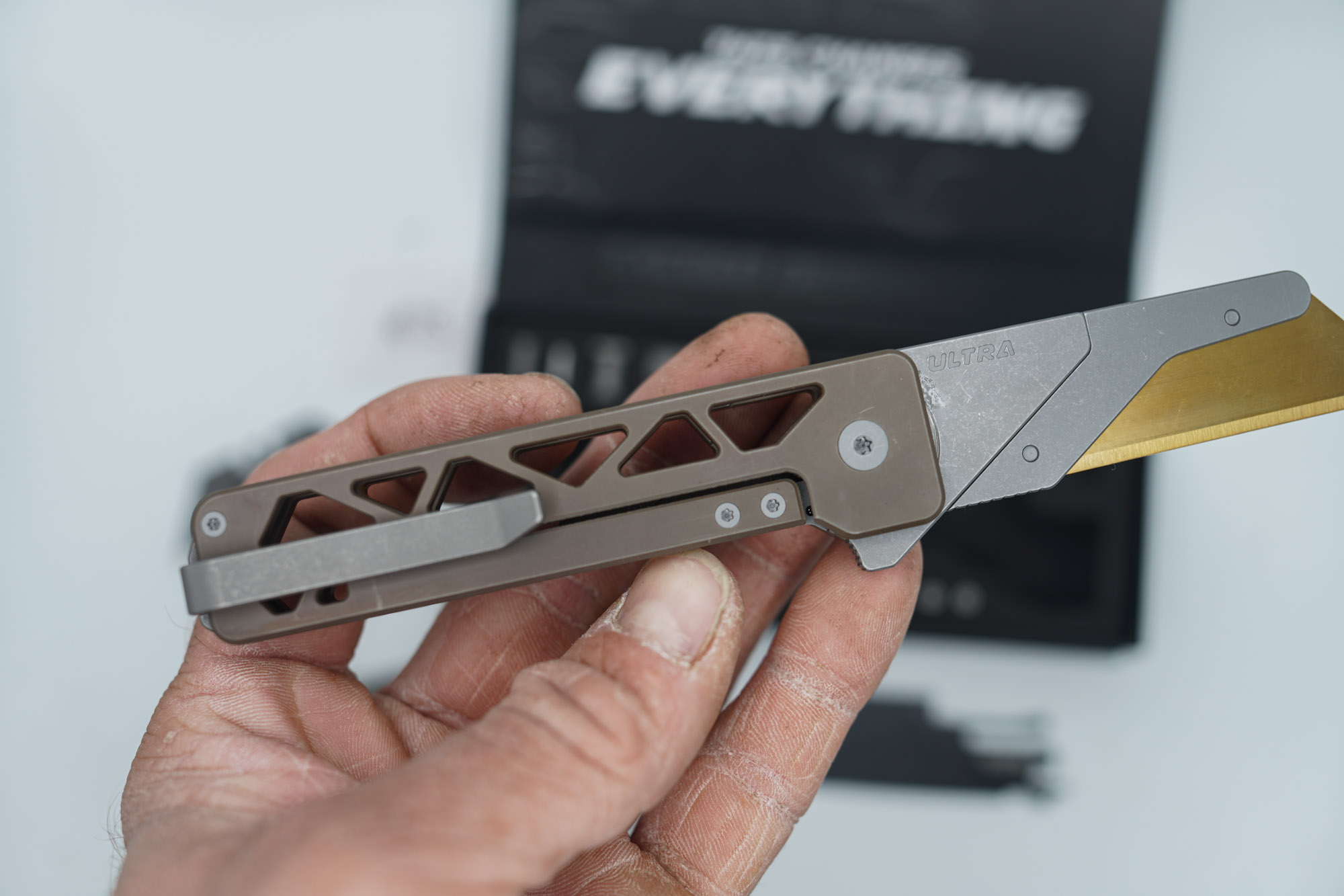 BUILD #85 — Condition 8/10 — TiRant ULTRA Skeleton 'SKULTRA' Centurion Bronze W/Blasted Grey Hardware + Original Box W/Spare Grey Blasted Hardware Kit / Lock Bar insert + FULL-FRAG Stonewashed Dark Grey Ti Backspacer + D2 Jet-Black Sheepsfoot Hotswap Blade + D2 Stonewashed Drop Point Hotswap Blade + 3X Custom Laser Engraved Razor Blades - Image 4