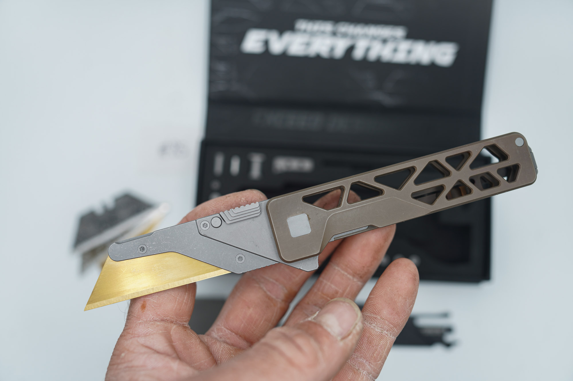 BUILD #85 — Condition 8/10 — TiRant ULTRA Skeleton 'SKULTRA' Centurion Bronze W/Blasted Grey Hardware + Original Box W/Spare Grey Blasted Hardware Kit / Lock Bar insert + FULL-FRAG Stonewashed Dark Grey Ti Backspacer + D2 Jet-Black Sheepsfoot Hotswap Blade + D2 Stonewashed Drop Point Hotswap Blade + 3X Custom Laser Engraved Razor Blades - Image 6
