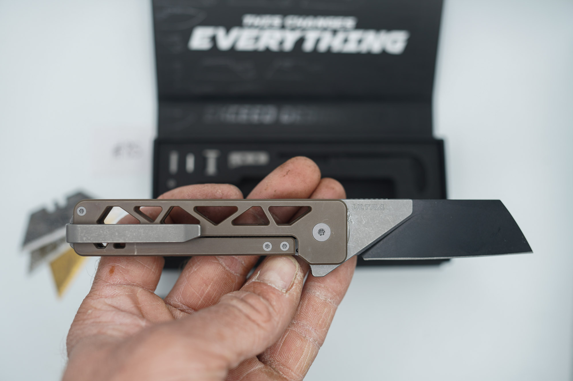 BUILD #85 — Condition 8/10 — TiRant ULTRA Skeleton 'SKULTRA' Centurion Bronze W/Blasted Grey Hardware + Original Box W/Spare Grey Blasted Hardware Kit / Lock Bar insert + FULL-FRAG Stonewashed Dark Grey Ti Backspacer + D2 Jet-Black Sheepsfoot Hotswap Blade + D2 Stonewashed Drop Point Hotswap Blade + 3X Custom Laser Engraved Razor Blades - Image 8