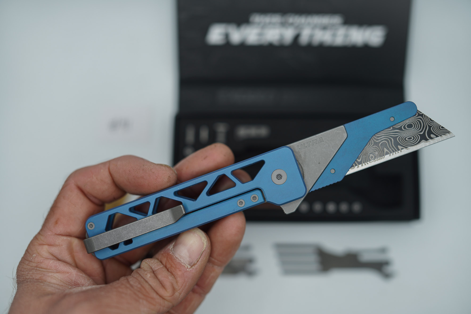 BUILD #91 — Condition 8/10 — TiRant ULTRA Skeleton 'SKULTRA' Aqua-BLUE Titanium ANO Applied + W/Grey Blasted Hardware + Original Box W/Grey Blasted Hardware Kit / Lock Bar insert + Blem Prototype Grind Titanium Fork Hotswap Insert + Blem D2 Stonewash Tanto Hotswap Blade + RARE Aqua-Blue ANO'd Fixed Razor Holder + 4X Custom Laser Engraved Razor Blades - Image 3