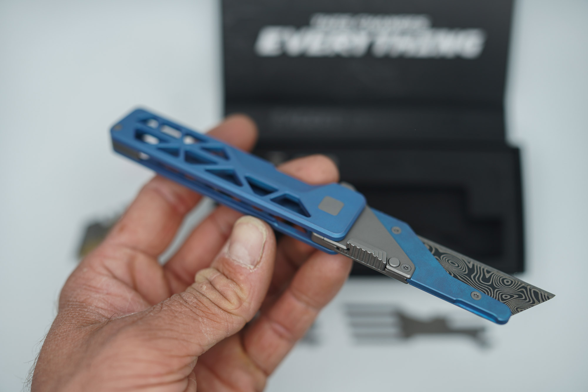 BUILD #91 — Condition 8/10 — TiRant ULTRA Skeleton 'SKULTRA' Aqua-BLUE Titanium ANO Applied + W/Grey Blasted Hardware + Original Box W/Grey Blasted Hardware Kit / Lock Bar insert + Blem Prototype Grind Titanium Fork Hotswap Insert + Blem D2 Stonewash Tanto Hotswap Blade + RARE Aqua-Blue ANO'd Fixed Razor Holder + 4X Custom Laser Engraved Razor Blades - Image 2
