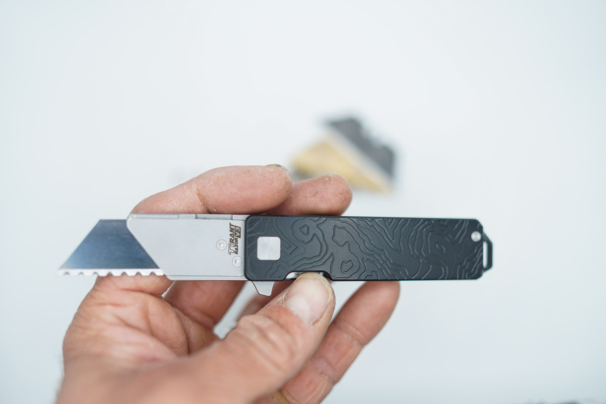 BUILD #118s — Condition 9/10 — TiRant RAZOR V3 Jet-Black PVD Dual-Sided 3D-Milled Cascadia Edition Prototype Laser-Etched + 38MM Mini Clip + Silver Hardware Contrast + Pre-Installed SKIFF Bearings + 4X Custom Laser Engraved Razor Blades From The ToolRoom - Image 4