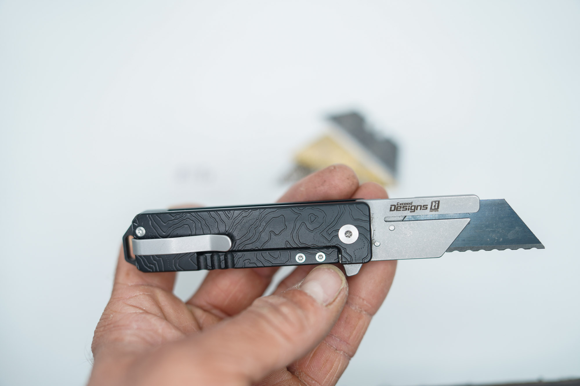 BUILD #118s — Condition 9/10 — TiRant RAZOR V3 Jet-Black PVD Dual-Sided 3D-Milled Cascadia Edition Prototype Laser-Etched + 38MM Mini Clip + Silver Hardware Contrast + Pre-Installed SKIFF Bearings + 4X Custom Laser Engraved Razor Blades From The ToolRoom - Image 2